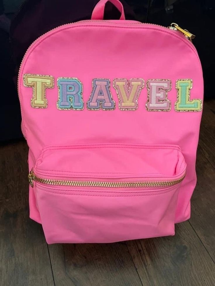 A supply or tool to make things *Description Super cute backpack! My kid is thrilled with it and can't wait for school to startGreat quality & excellent personalization!  COLORS: baby pink, baby blue, purple, mint Dimensions: 15 x 11 x 5 in Select number of patches and in the personalization section please be specific about what you want and placement! This bag can fit 5-6 letters across and can have other fun patches spread around the bag!  Option: 1-You can choose up to 6 letters(2.25") or 4 l Fun Travel Backpack With Zipper Closure, Fun Everyday Standard Backpack, Educational Backpack For Travel, Educational Style Backpack For Travel, Fun Backpack For Everyday Use And Back To School, Playful Nylon School Bag, Fun Multicolor Backpack For Travel, Pink Fun Backpack For Back To School, Fun Pink Backpack For Back To School