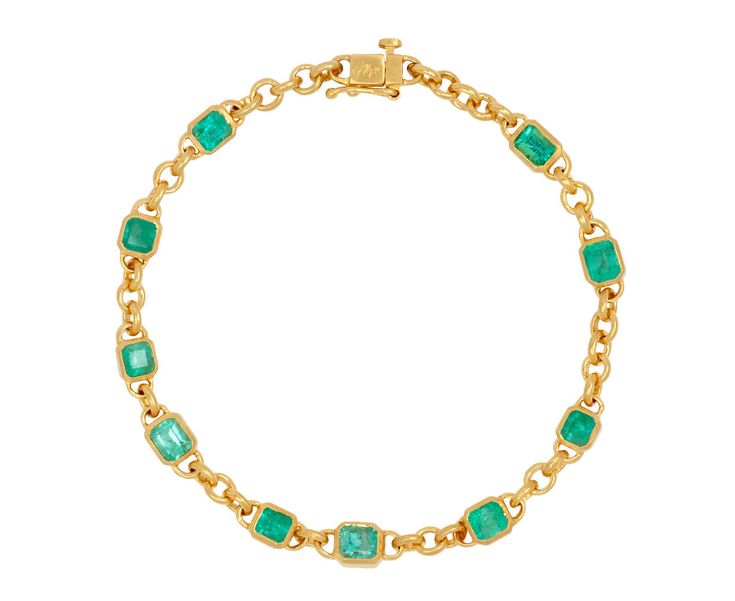 Wear this stunning Darius bracelet for the perfect amount of cool toned color and restrained luxury. Set along the 24K yellow gold plated 18K yellow gold fairy chain are bezel set rectangular mint green emeralds. Alone or as the finishing touch to a layered look, its elegance has an effortless, classic style. total length : 7" : 18K yellow goldemeralds : about 3mm x 4mm each : 3.36cttw18K yellow gold safety clasp closure Luxury Green Rectangular Bracelets, Luxury Green Gold Bracelet As A Gift, Luxury Green Gold Bracelet For Gift, Rectangular Emerald Gold Jewelry, Elegant Green Rectangular Bracelet, Rectangular Gemstone Bracelet In Yellow Gold, Green Rectangular Bracelet For Formal Occasions, Rectangular Yellow Gold Bracelet With Gemstone, Green Rectangular Bracelets For Formal Occasions