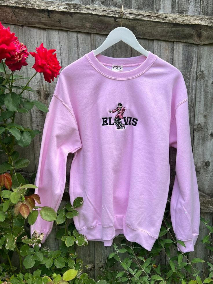 Embroidered Sweatshirt For Winter Streetwear, Embroidered Sweatshirt For Streetwear In Winter, Pink Hoodie With Embroidered Text For Winter, Winter Pink Hoodie With Embroidered Text, Trendy Embroidered Logo Sweater For Fall, Spring Letter Embroidery Sweatshirt For Streetwear, Fall Crew Sweats With Embroidered Logo, Pink Embroidered College Sweatshirt, Spring Embroidered Sweatshirt For Streetwear