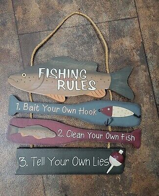 five different types of fishing rules hanging on the floor with rope and tags attached to them