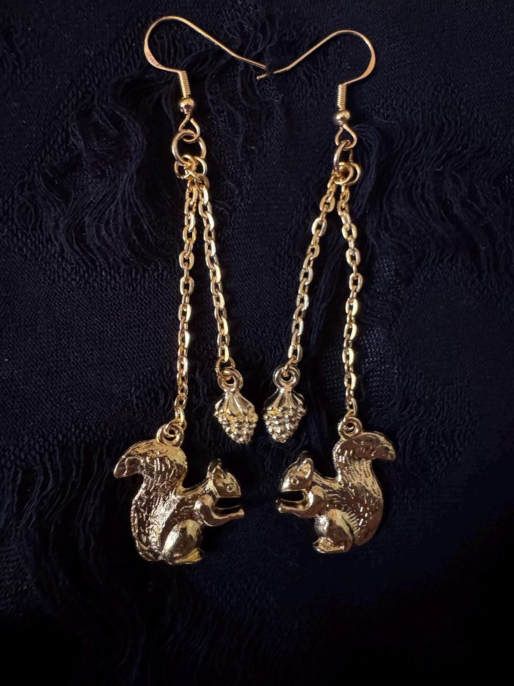 Beautiful Brass Squirrels with nuts and 14k gold plated hooks very darling and light weight. Gold color in appearance, the lighting is weird on iphones Squirrels, Last Minute Gifts, Small Gifts, Nuts, Jewelry Earrings Dangle, Gold Color, Dangle Drop Earrings, Dangle Earrings, 14k Gold