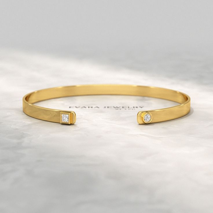 Indulge in timeless elegance with our exquisite Diamond Solitaire Cuff Bracelet. Crafted from radiant 10K, 14K, or 18K solid gold, this cuff exudes sophistication. Its shimmering lab-grown diamond, meticulously set in a prong setting, captivates with its brilliance. Wear it as a statement piece or a cherished keepsake, this custom cuff bangle bracelet is a testament to your impeccable taste. 𝐅𝐞𝐚𝐭𝐮𝐫𝐞𝐬: * 𝐌𝐚𝐝𝐞 𝐭𝐨 𝐎𝐫𝐝𝐞𝐫 * 𝐌𝐞𝐭𝐚𝐥: 𝟏𝟎𝐊 𝐆𝐨𝐥𝐝 | 𝟏𝟒𝐊 𝐆𝐨𝐥𝐝 | 𝟏𝟖𝐊 𝐆? Cuff Bangle Bracelet, Bracelet Handmade, Cuff Bangles, Conflict Free Diamonds, 10k Gold, Diamond Solitaire, Gold Bands, Bangle Bracelet, Handmade Bracelets