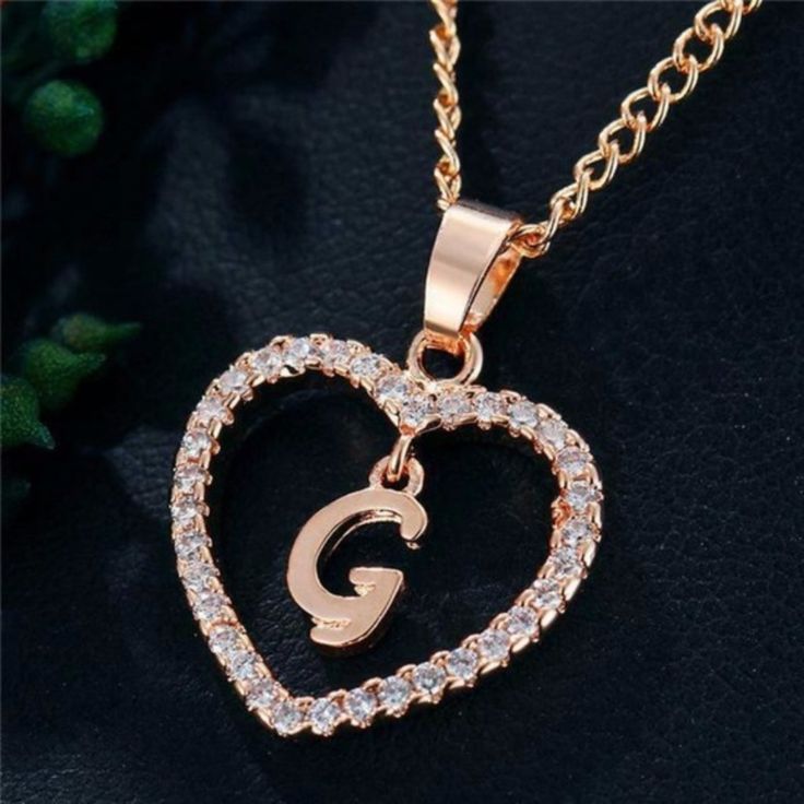 Initial Letter G Fine Or Fashion: Fashion Item Type: Necklaces Metals Type: Zinc Alloy Gender: Women Necklace Type: Pendant Necklaces Style: Classic Chain Type: Snake Chain Material: Metal Model Number: Mc323-Mc348 Pendant Size: 1.5cm Is_customized: No Brand Name: Yanqueens Shape\Pattern: Letter Length: 43+6cm Classic Jewelry Pieces, Jewelry Name, Initial Heart Necklace, Avengers Logo, Indian Tunic, Alphabet Images, Letter Pendant Necklace, Name Initials, Initial Pendant Necklace