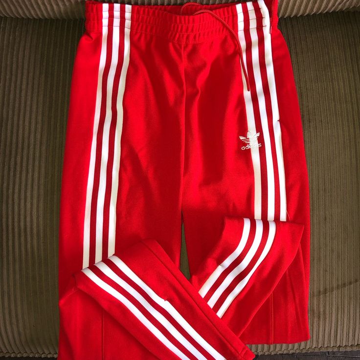 Adidas Originals Track Pants. Brand New, Never Worn. Tighter Fit In The Legs. Price Is Firm! Matching Jacket Is Also On My Shop! Adidas Flared Pants, Red Adidas Pants Outfit, Adidas Red Track Jacket For Streetwear, Red Adidas Pants, Red Track Pants, Sporty Red Streetwear Pants, Adidas Track Pants, Adidas Track, Personal Style Inspiration