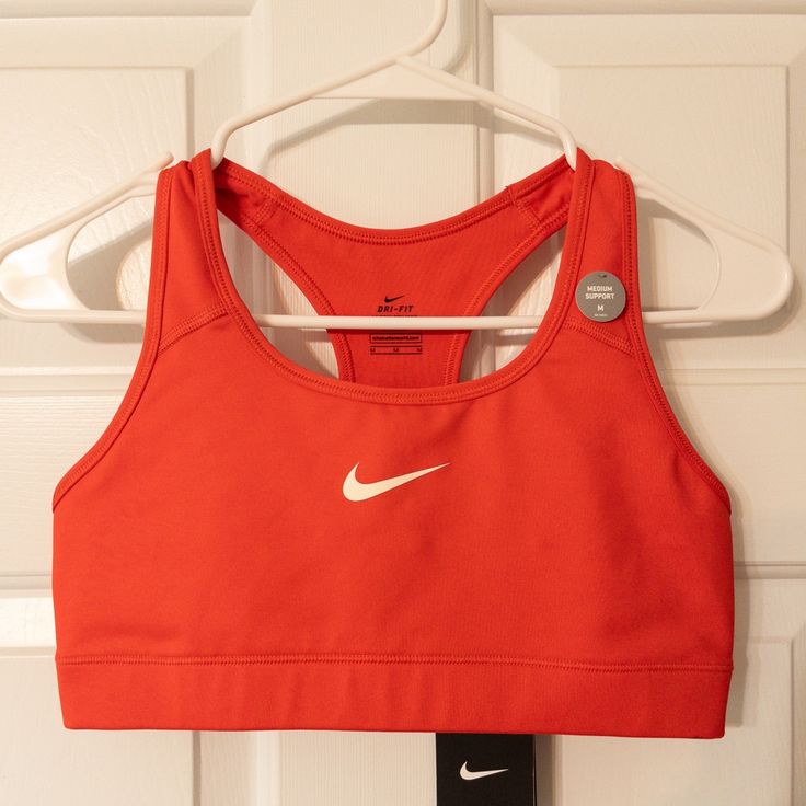 Nike Red Sports Bra Bnwt Medium Red Sports Bra For Training, Red Sportswear Tops For Spring, Red Casual Activewear For Sports, Spring Sportswear Tops In Red, Red Spring Sportswear Tops, Red Activewear For Sports, Red Activewear For Sports In Spring Season, Red Activewear For Spring Sports, Red Moisture-wicking Sports Bra For Sports Events