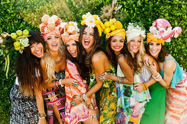 a group of women standing next to each other