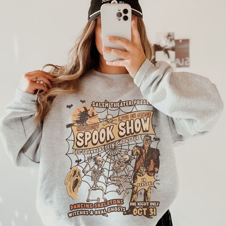 This Halloween Shirt has a retro vibe with a fun Monster Mash themed graphic. Celebrate Spooky Season with a cute Fall shirt that you will want to wear on repeat.  This is a relaxed fit unisex sweatshirt, but true to size. We recommend sizing up if you want a trendy oversized look. - M A T E R I A L S - Gildan® Sweatshirt 8 oz./yd² (US) 50/50 cotton/polyester Heather Sport colors: 60/40 polyester/cotton Loose Fit Ribbed Knit Collar to retain shape - C A R E  I N S T R U C T I O N S - Inside out, Salem Halloween, Spooky Sweatshirt, Cute Fall Shirt, Halloween Crewneck, Frankenstein Halloween, Gildan Sweatshirt, Monster Mash, Sweatshirt Cute, Gildan Sweatshirts