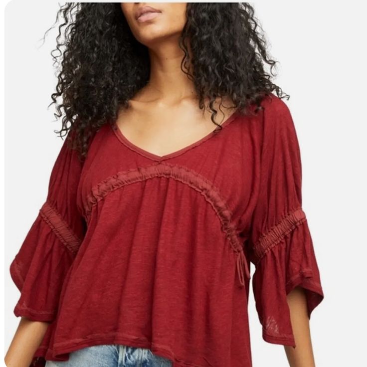 Free People Sand Storm Top In Sanquine Size Small Brand New With Tags Brand New With Tags Free People Red Top Sand Storm Top Color: Sanquine V-Neckline 3/4 Sleeve Pullover Style Drawstrings Detail ( Missing 1 Drawstring On Back ) Handkerchief Hem Sz Small Burgundy V-neck Top For Summer, Burgundy V-neck Blouse For Summer, Burgundy V-neck Summer Top, Summer Burgundy V-neck Top, Casual Burgundy Tops For Day Out, Bohemian Burgundy Tops For Spring, Bohemian Burgundy Top For Spring, Casual Burgundy Blouse For Spring, Red Casual Top For Brunch