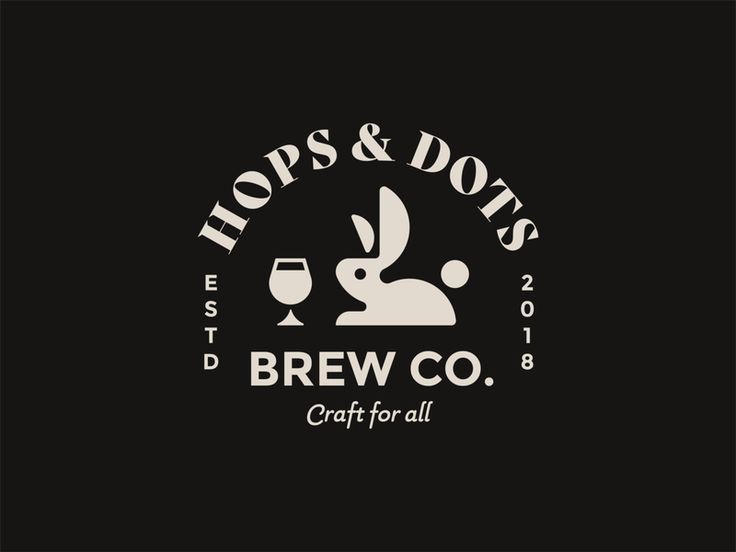 hops and dots brewing logo on a black background with wine glass in the foreground