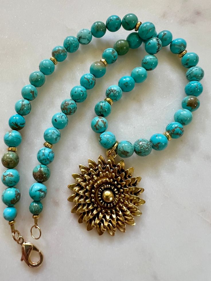 Turquoise Necklace Gold Daisy Pendant, 17.5in, Gold Filled Clasp, Gold Accent Beads, Non-Tarnish Nature Pendant, Statement Necklace, Nunn by HarmonyinStones on Etsy Turquoise Jewelry With Round Natural Stone Beads, Elegant Turquoise Necklace With 8mm Beads, Spiritual Single Strand Round Jewelry, Spiritual Single Strand Jewelry, Turquoise Gemstone Beads Jewelry, Elegant Turquoise Jewelry With 8mm Beads, Spiritual Jewelry With 8mm Round Beads, Artisan Turquoise Necklace With Polished Gold Beads, Artisan Gold Turquoise Necklace With Polished Beads