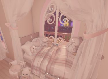 there is a bed with teddy bears on it in the room that has white curtains