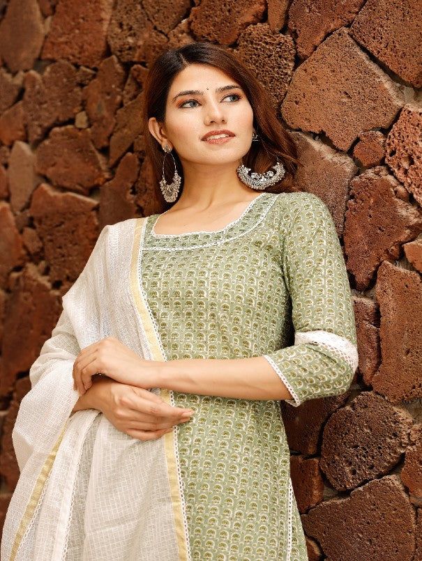 Embrace your personal style with the summer green motif print cotton kurta set with doria dupatta. The classic cotton handloom work, 3/4 sleeves and boat-neck type makes it a must have. Complete your look with ear cuffs, a delicate wristlet, peep-toe heels and an embellished potli for the family functions. Set contains kurta, pants and dupatta. Neck: Boat Neck Sleeve Length: 3/4th Sleeves Kurta Length: Calf Length Fabric: Kurta & Botton - Cotton Dupatta - Kota Doria Note: Wash Care Instructions Green Cotton Silk Kurta With Chikankari Embroidery, Green Cotton Silk Sharara With Straight Kurta, Green Chikankari Embroidered Palazzo Set For Summer, Green Mulmul Palazzo Set With Chikankari Embroidery, Green Sharara With Chikankari Embroidery In Mulmul, Green Mulmul Sharara With Chikankari Embroidery, Green Cotton Silk Churidar With Straight Kurta, Green Mulmul Palazzo Set For Festivals, Traditional Green Kurta With Bandhani Print