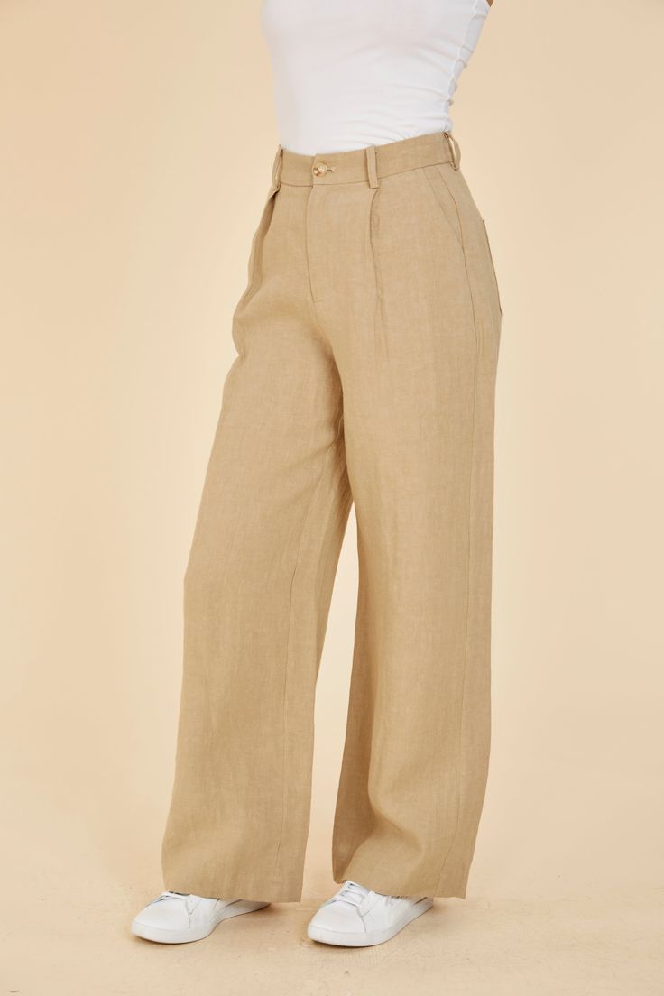 Indulge in breezy comfort with our Linen Wide Leg Pants. Lightweight and comfortable, these pants are the epitome of easygoing style. Their breathability makes them the perfect choice for spring, ensuring you stay cool while exuding effortless elegance. The wide leg adds to the casual vibe, making these pants a versatile and comfortable wardrobe staple for the season. Embrace the airy feel with every step in these spring-ready wide leg linen pants. Linen Wide leg Comes in White and Linen Match w Comfortable Wide Leg Straight Pants, Solid Linen Bottoms For Day Out, Linen Bottoms For Day Out, Comfortable Wide Leg Pants For Everyday, Relaxed Solid Color Pants With Loosely Fitted Hips, Neutral Wide Leg Bottoms For Everyday, Relaxed Solid Pants With Loosely Fitted Hips, Relaxed Pants With Loosely Fitted Hips, Beige Straight Pants For Everyday