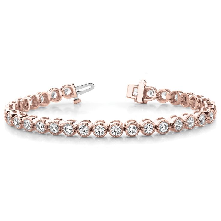 This classic tennis bracelet design is reimagined with modern elegance, featuring bezel-set lab diamonds for a contemporary yet timeless aesthetic. BRACELET INFORMATION SKU: JNCY70227 Metal type 14k White Gold 14k Yellow Gold 14k Rose Gold Color: White, Yellow, Rose Style: Tennis Bracelet Gender: Unisex Weight (grams): 8.7 Count (appx): 73 Clasp: Box Clasp Rhodium Plated: White Gold Only DIAMOND DETAILS Stone Type: Diamond Creation Type: Lab Grown Shape: Round Color: Near Colorless (F-G) Color Hue: White Clarity: SI1+ Count (appx): 73 Carat Weight: .014 Total Carat Weight: 1.00 Setting: Bezel Red Gold Jewelry, Pink Gold Jewelry, Rose Gold Jewellery, Jewelry Rose Gold, Diamond Tennis Bracelet, Bezel Set Diamond, Gold Diamond Jewelry, Fine Jewelry Bracelets, Tennis Bracelet Diamond