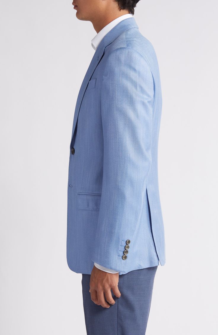 When a jacket is required during the sunnier seasons, this pale blue option is what to wear. 30" length (size 52 EU) One-button closure Notched lapels Chest welt pocket; front flap pockets Lined 100% viscose Dry clean Imported Spring Single Button Flat Front Blazer, Blue Fitted Button-up Sport Coat, Fitted Blue Button-up Sport Coat, Solid Suit With Lapel Collar For Spring, Spring Suits With Lapel Collar, Classic Light Wash Outerwear For Work, Spring Suits With Single Button, Business Casual Suit With Button Closure For Spring, Blue Single Breasted Button-up Sport Coat