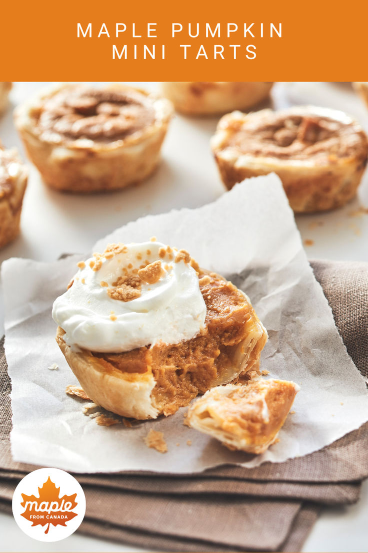 a close up of a pastry on a napkin with the words maple pumpkin mini tarts