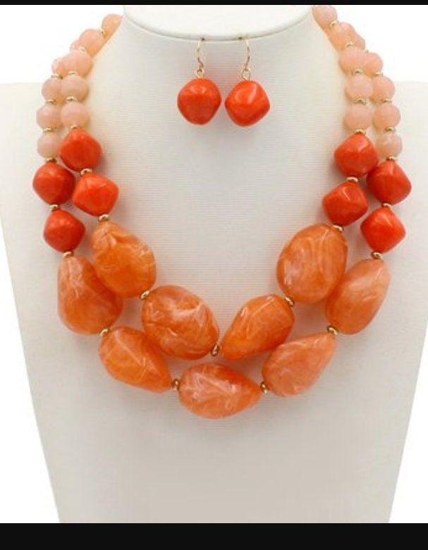 Each piece is a unique set that stands out and gives you that added touch of class in vibrant colors.It is the quintessential piece for that event be it a wedding,quintesera, birthday or graduation! Eye-catching Multicolor Jewelry For Party, Eye-catching Gold Jewelry For Party, Trendy Summer Party Jewelry, Elegant Orange Polished Beads Jewelry, Elegant Orange Necklaces With Polished Beads, Elegant Orange Jewelry With Polished Beads, Trendy Gold Jewelry With Natural Stones, Summer Party Beaded Jewelry, Elegant Coral Beaded Jewelry