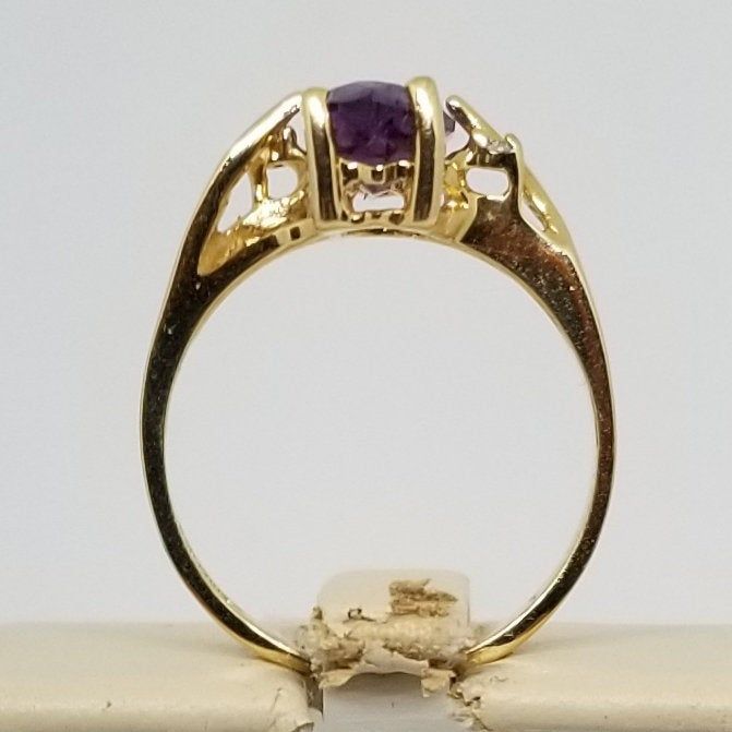 "We do not check prongs for wear or stones for looseness. All items are sold as is-noting that we are a resale shop so everything here had a previous owner! We will include flaws in the description when noted. This is one of the reasons our items are more affordable than new at a jewelry store. Vintage 10K Yellow Gold Ring with Amethyst & Diamonds, Size 5.75. Stamped 10KP inside band. Weighs 1.5 dwt. Please stop in often as we will be adding additional vintage fine jewelry beauties. Note tha Gold Heirloom Amethyst Birthstone Ring, Heirloom Gold Birthstone Ring With Amethyst, Heirloom Amethyst Birthstone Ring In Gold, Vintage 14k Gold Amethyst Ring With Accent Stones, Gold Amethyst Ring Stamped 14k, 14k Stamped Amethyst Ring, Gold Amethyst Birthstone Ring With Accent Stones, Formal Gold Amethyst Ring With Birthstone, Formal Gold Amethyst Birthstone Ring