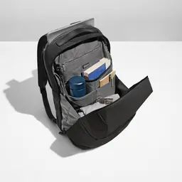 an open backpack sitting on top of a white table