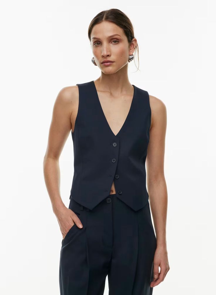 Babaton DENIRO VEST | Aritzia US Tailored Vest With Button Closure For Workwear, Tailored Workwear Vest With Buttons, Tailored Buttoned Vest For Workwear, Workwear Vest With Notch Lapel And Hidden Buttons, Wool Vest With Button Closure For Workwear, Notch Lapel Vest With Hidden Button Closure For Work, Tailored Business Casual Vest With Button Closure, Tailored Vest With Button Closure For Business Casual, Classic Fitted Blazer For Layering