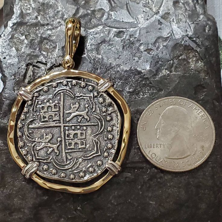 This coin is made from the silver bars recovered from the Atocha. I use moulds from the original coins to get the print. This is a replica but actually made from the silver from the Atocha. The frame around is sterling silver with a 14kt gold overlay and the prongs are sterling silver for an amazing contrast. I use a hammered finish for the frame that gives this piece a beautiful and rich appearance. This is a big, beautiful and statement piece. A true eye-catcher and a stunning piece of history Collectible Round Coin Pendant Jewelry, Traditional Round Jewelry For Commemoration, Etched Coin Jewelry For Anniversary, Engraved Coin-shaped Brass Jewelry, Engraved Brass Coin Jewelry, Heirloom Coin Pendant Collectible Jewelry, Ceremonial Engraved Coin Jewelry, Ceremonial Coin-shaped Engraved Jewelry, Ceremonial Engraved Coin-shaped Jewelry