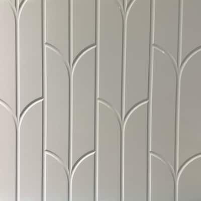 a white wall with decorative lines on it