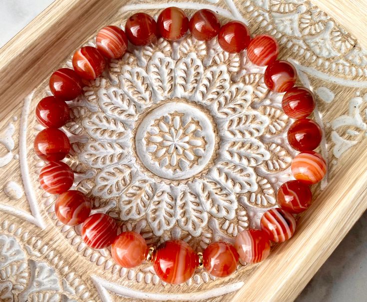 💕8mm Red Agate Crystal Beaded Bracelet You will receive 1 Bracelet  - This can be a perfect gift for someone special!! - Natural Gemstones feels nice to wear and touch. - Suitable for daily wear that will go well with any style. - Metaphysical properties of healing stones may help you to relief stress and protect you from negative energy. - All Bracelets will come with a meaning card. D E T A I L  Genuine Gemstones - 8mm Red Agate Latex Free - Strong Stretch Cord 💕These are made-to-order. Size Red Gemstone Bracelet, Protection From Negative Energy, Crystal Beads Bracelet, Red Gemstones, Single Stone, Red Agate, Healing Bracelets, Agate Crystal, Red Stripe