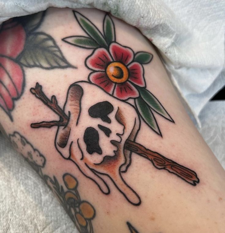 Haunted marshmello tattoo - cute skull tattoo - silly tattoo Traditional Candy Skull Tattoo, Traditional Jackolantern Tattoo, Bug Elbow Tattoo, Girly Bat Tattoo, Summerween Tattoo, Fruit Bat Tattoo Design, Traditional Fortune Teller Tattoo, Halloween Cookie Tattoo, Funny Food Tattoos