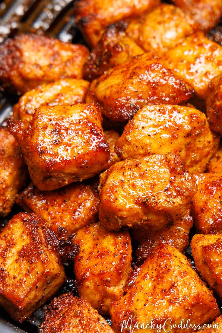 Juicy air fryer pork chop bites piled on top of each other. Air Fryer Pork Fillet Recipes, Center Lion Pork Chops Air Fryer, Pork Chop Bites In Oven, Thai Pork Chop Recipes, Air Fryer Butterfly Pork Chops, Air Fryer Pork Belly Bites, Air Fryer Pork Bites, Pork Bites Air Fryer, Pork Chop Bites Air Fryer