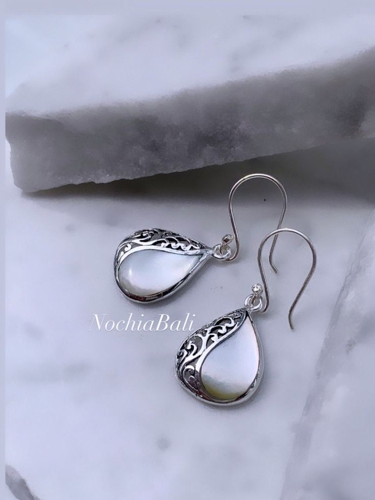 White Natural Mother of Pearl Earring, Mother of Pearl Teardrop, Boho Teardrop earring, Bridesmaids earring, Christmas Gift idea Luxury Teardrop Mother Of Pearl Earrings, White Pear-shaped Teardrop Earrings For Anniversary, White Dangle Teardrop Earrings With Elegant Design, White Elegant Dangle Teardrop Earrings, White Elegant Teardrop Dangle Earrings, Elegant White Teardrop Earrings For Gift, Pearl Drop Teardrop Pendant Earrings For Gift, Pearl Drop Teardrop Pendant Earrings As Gift, Teardrop Pearl Earrings Gift