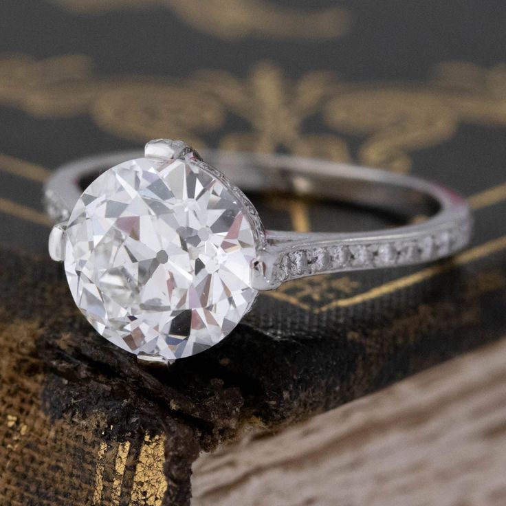 As beautiful and timeless as they get! A stunning, crisp and white old European cut diamond is set in this sleek and simple concoction, allowing the diamond to shine in its full old cut glory. Check out that much-desired flower facet pattern and sharp contrast zones.A beautiful ring that would be a truly special engagement ring. Platinum Size 6.75 & fully resizable Diamond measures 9.25 - 9.32 x 5.62 mmGIA link herehttps://www.gia.edu/report-check?reportno=6224122563*Diamond is also available lo Modern Mens Rings, Art Jewelry Earrings, Special Engagement Ring, Engagement Ring Platinum, Diamond Solitaire Ring, Antique Watches, Antique Engagement, European Cut Diamonds, Mens Band