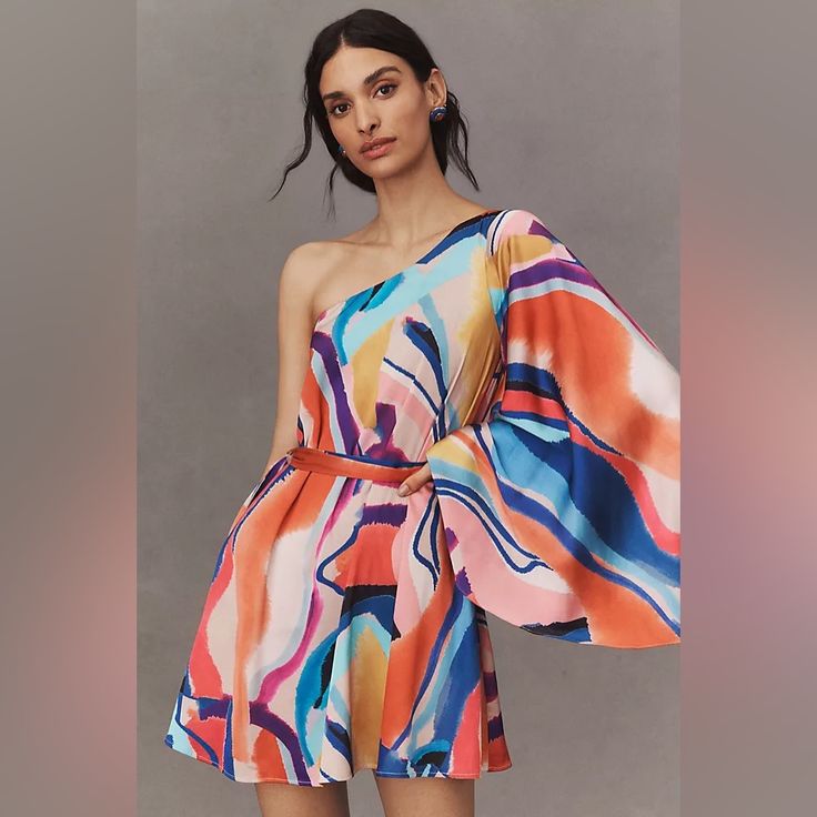 Let The Colors Pop As You Shimmy Down The Dance Floor In This One-Shoulder Silhouette. With Its Multi-Printed Satin Fabric, The Stevie Defies Tradition While Maintaining A Go-To Silky Feel. Care & Content Polyester, Elastane Mini Length Fit-And-Flare Silhouette Pull-On Styling One-Shoulder Styling Hand Wash Imported Size & Fit Measures 34” From Shoulder To Hem Bhldn Dress, Satin Mini Dress, The Dance, Anthropologie Dress, Printed Mini Dress, Dance Floor, Satin Fabric, Passion For Fashion, Fit And Flare