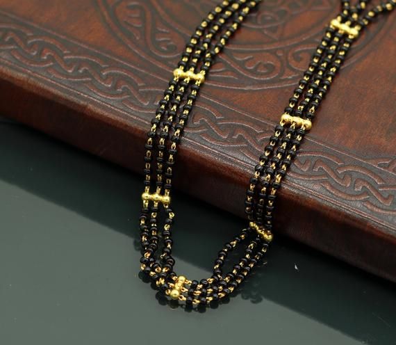 22kt yellow gold hallmarked 916 wedding anniversary flexible bracelet, amazing customized black stone beaded bracelet gifting jewelry.Metal-22kt yellow gold.Item type-Beaded Bracelet.Weight-7.600 gram approx.(vary as per length)Length-select length as your wrist size.Width-0.9 centimeters approx.black beads size-2.7 mm approx.Stamped-916/22kt hallmarked.Make excellent gifting for wedding, anniversary, birthday, Christmas day, valentines day, mother's day. Black Bracelets For Festivals, Black Festive Bracelets For Festivals, Traditional Black Bracelets For Weddings, Traditional Black Bracelet For Wedding, Traditional Black Jewelry For Anniversary, Black Jewelry With Gold Beads For Formal Occasions, Black Wedding Jewelry With Gold Beads, Formal Black Jewelry With Gold Beads, Traditional Black Wedding Bracelets