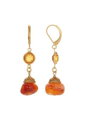 These earrings present an enchanting blend of textures and hues, melding marble-inspired carnelian beads with circular channel topaz glass crystals. The juxtaposition of these elements crafts a captivating design radiating sophistication. | 1928 Jewelry Gold Tone Topaz Bead Earrings, Beige Elegant Orange Earrings With Natural Stones, Amber Czech Glass Drop Earrings, Amber Natural Stones Earrings For Jewelry Making, Elegant Baltic Amber Jewelry With Natural Stones, Elegant Orange Czech Glass Jewelry, Elegant Amber Round Bead Earrings, Elegant Amber Czech Glass Jewelry, 1928 Jewelry, Carnelian Beads