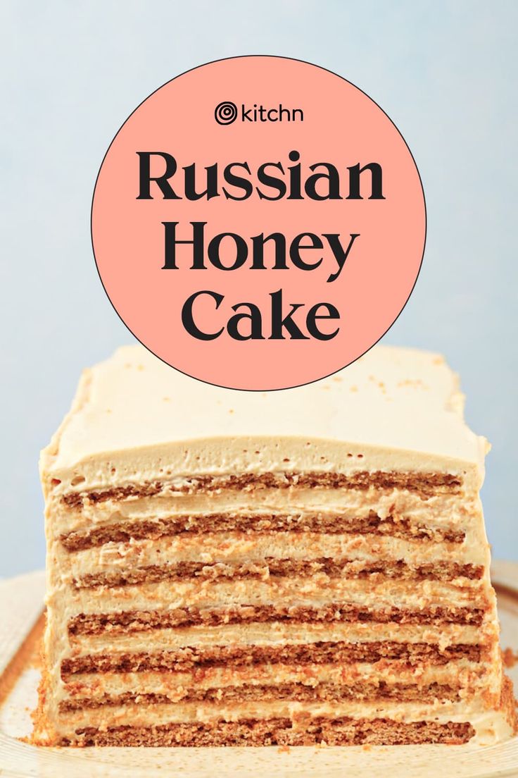 a close up of a cake on a plate with the words russian honey cake above it