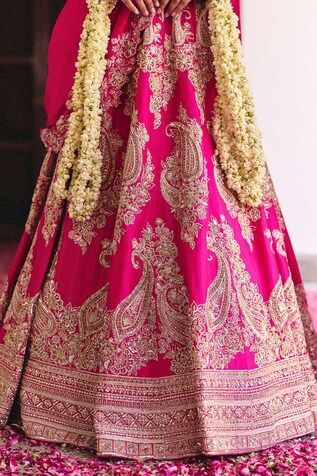 Fuchsia pink kalidar lehenga crafted in pure silk with all over Gul embroidery using zardozi, embossed motifs, intricate kasab and pearl highlights. Paired with a matching embroidered leaf neck cap sleeves cutwork border blouse and an embroidered pure silk dupatta. - Aza Fashions Pink Tilla Dupatta, Festive Pink Tilla Dupatta, Pink Zari Work Dress For Traditional Ceremonies, Pink Tilla Dupatta For Diwali, Pink Tilla Choli For Festive Occasions, Pink Gown With Intricate Embroidery For Traditional Ceremonies, Pink Lehenga With Tilla For Diwali, Pink Tilla Dupatta For Wedding, Festive Pink Choli With Tilla Detailing