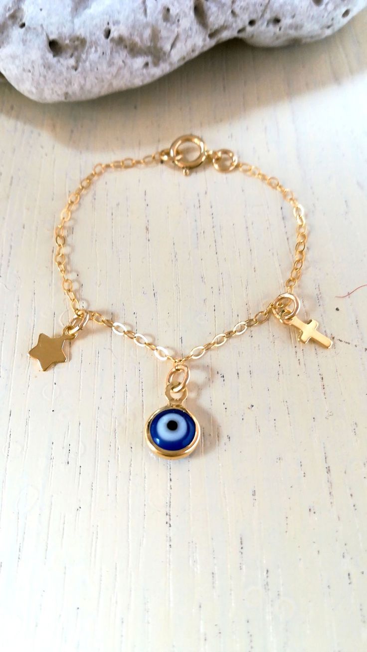 Baby Evil Eye Bracelet 14k Gold Fill with Cross and Star Baby | Etsy Dainty Blue Jewelry With Star Charm, Baby Girl Baptism Gift, Gift For Newborn Baby, Gift For Newborn, Girl Baptism, Infant Girl, Tiny Star, Baptism Girl