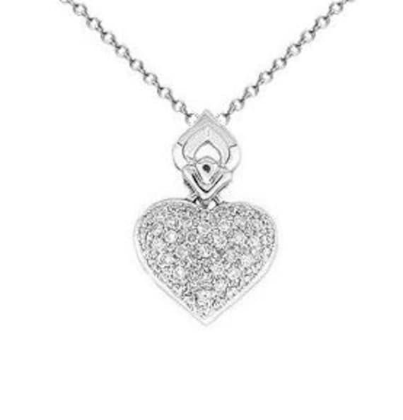 Imagine you're at a party and everybody's talking about your diamond heart necklace. Yes, this elegant diamond heart necklace is sure to be noticed. It features 0.50-carat round diamonds set in 18k white gold. The pendant is suspended from an 18-inch cable chain that secures with a lobster claw clasp.  Diamond Weight: 0.50 ct Diamond Color: H Diamond Clarity: SI White Gold Heart Cut Diamond Necklace With Pave Setting, Classic Diamond Necklace With Heart Charm, Diamond White Diamond Heart Necklace For Formal Events, Diamond White Diamond Heart Necklace For Formal Occasions, Silver Heart-shaped Diamond Necklace With Pave Setting, Diamond White Heart Necklace With Pave Setting, Valentine's Day Diamond White Necklace With Pave Setting, Formal Cubic Zirconia Diamond Necklace With Heart Charm, Diamond White Fine Jewelry Necklace With Heart Charm