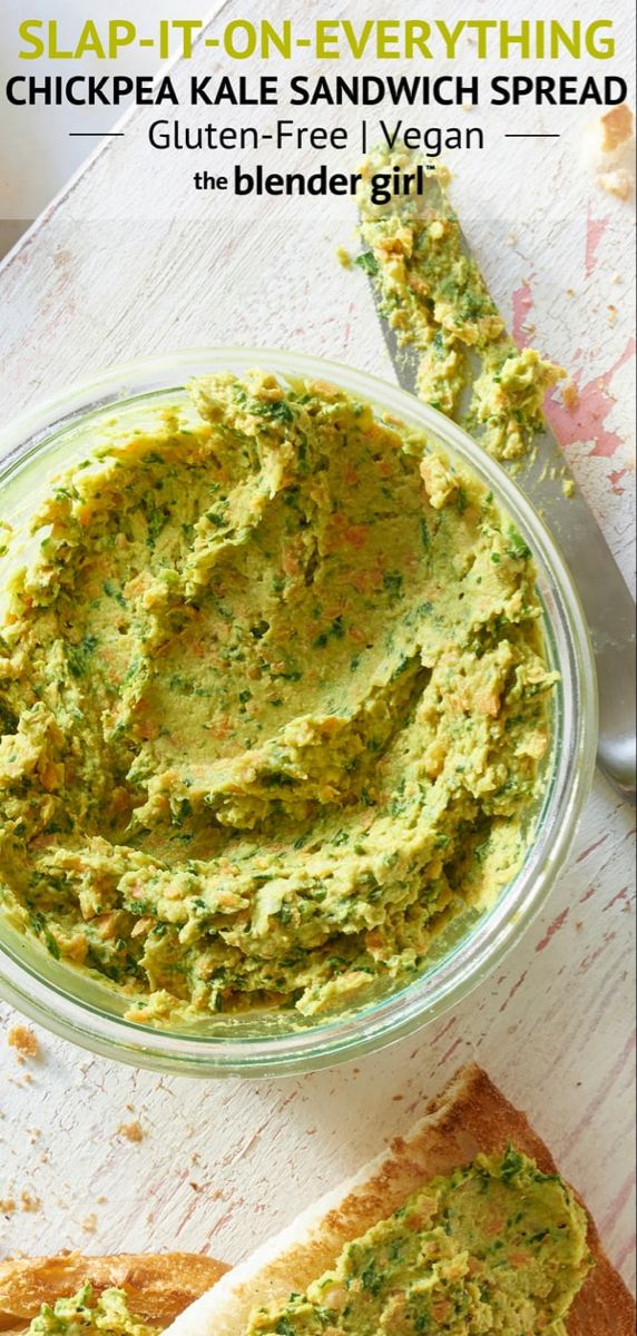 guacamole spread in a glass bowl with a spoon next to it