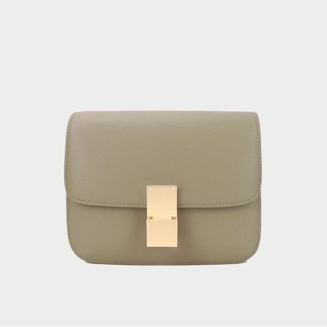 This classic beauty is a must have! Genuine Leather Please note: the maximum number of letters that can be monogrammed is 10. Luxury Everyday Envelope Bag, Luxury Envelope Bag For Everyday, Classic Beige Clutch Bag, Classic Gold Shoulder Bag, Luxury Everyday Envelope Shoulder Bag, Classic Beige Rectangular Flap Bag, Timeless Beige Rectangular Flap Bag, Classic Gold Rectangular Shoulder Bag, Classic Box Bag For Daily Use