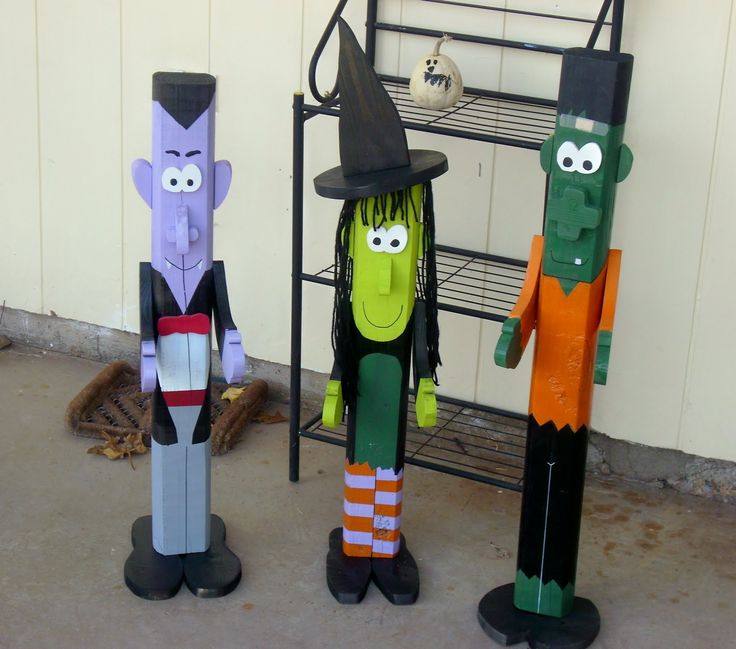 three halloween decorations made to look like cartoon characters