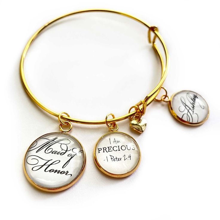 "Create your own meaningful wedding bridal party jewelry and gifts and DIY projects with our Wedding Bridal Party charms - add to bracelets, invitations, bouquets, wine charms, candles and favors... the possibilities are endless! Order along with our Wedding \"Faith Hope Love\" 1 Corinthians Scripture charm set, personalized wedding charms, and Bangle Bracelet Making Kits. Give personalized bangle bracelets to your bridesmaids or have a bracelet-making party at a bridal shower or bachelorette pa Adjustable Gold Charm Bracelet For Wedding, Personalized Gold Jewelry For Special Day, Personalized Gold Charm Bracelet For Wedding, Personalized Round Jewelry For Wedding, Personalized Round Wedding Jewelry, Personalized Bangle For Bridesmaid Gift, Customized Jewelry For Bridesmaid Gift On Mother’s Day, Customized Jewelry For Bridesmaid Gift On Mother's Day, Personalized Bangle Jewelry For Bridesmaid Gift