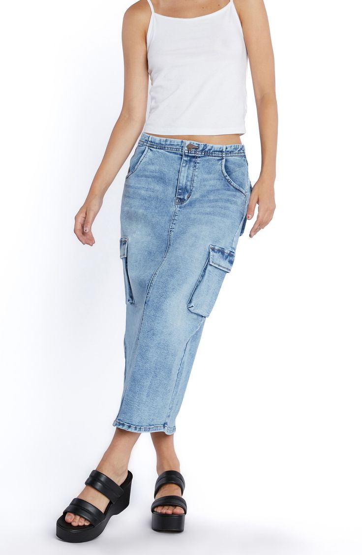 Perfect your casual-cool vibe in this trend-right denim maxi skirt designed in a faded wash with cargo pockets and an airy back vent. 31 1/2" length 72% cotton, 17% rayon, 10% polyester, 1% spandex Machine wash, tumble dry Imported Casual Medium Wash Full-length Maxi Skirt, High Rise Denim Cargo Skirt With Side Pockets, Dark Wash High Rise Casual Maxi Skirt, Casual Medium Wash Full Length Maxi Skirt, Casual High Rise Dark Wash Maxi Skirt, Utility Style Medium Wash Denim Skirt, Casual Medium Wash Cargo Skirt, Casual Denim Cargo Skirt In Dark Wash, Mid-rise Denim Cargo Skirt