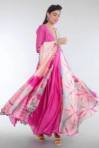 Pink angarkha kurta featuring a deep V neck and three-quarter sleeves with tie-dye patterns. Paired with matching pant and stole, both showcasing a tie-dye design and embellishments., Fit: Relaxed Bohemian Anarkali Set With Long Sleeve And Dupatta, Bohemian Floor-length Kurta With Sheer Dupatta, Long Sleeve Pink Silk Anarkali Set, Pink Long Sleeve Silk Anarkali Set, Pink Silk Long Sleeve Anarkali Set, Bohemian Kurta With Gota Work And Long Sleeves, Bohemian Long Sleeve Kurta With Gota Work, Pink Long Sleeve Palazzo Set For Transitional Season, Cotton Silk Long Sleeve Palazzo Set For Navratri