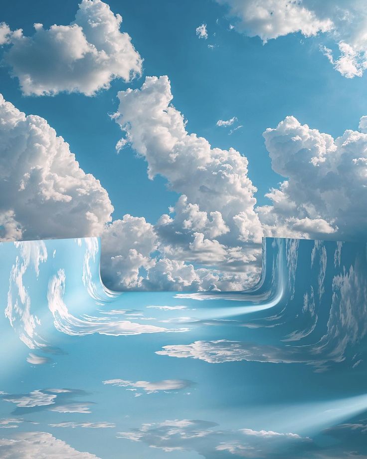 an image of the ocean with clouds in the sky and water on the ground below