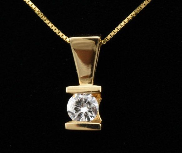 "Features * ITEM #: 3300P * METAL TYPE: 14 Karat Yellow Gold * AVAILABLE IN: Rose Gold, Yellow Gold, White Gold * STONES USED: Diamond * DIAMOND QTY:1 * DIAMOND SHAPE:ROUND * DIAMOND WEIGHT-.25Ct COLOR AND CLARITY g-i1 * SETTING TYPE: Hand Channel Set WEIGHT 2,1 gm LONG 13mm with bail Width 4.5mm * READY TO SHIP: in 3-5 Business Days FOR ADDITIONAL QUESTIONS ABOUT THIS PRODUCT: Please feel free to message us. We are quick to respond to all your inquiries. PLEASE choose as \"FAVORITE\" on the rig Luxury Solitaire Necklace With Round Diamond, Modern Diamond Solitaire Necklace For Formal Occasions, Gold Solitaire Necklace With Round Stone For Formal Occasions, Modern Solitaire Diamond Necklace For Formal Occasions, Gold Solitaire Necklace For Formal Events, Solitaire Necklace With Round Pendant For Formal Occasions, Modern Solitaire Necklace With Single Round Cut Diamond, Modern Round Solitaire Necklace With Diamond Cut, Gold Solitaire Necklace With Brilliant Cut For Formal Occasions