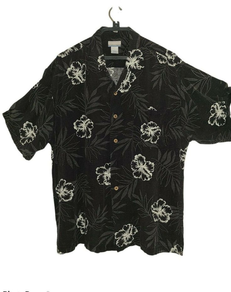 Breakwater Men's Black White Floral Hawaiian Button Up Shirt L Tropical Aloha A pre-owned Hawaiian floral black and white shirt. Short sleeve, button down shirt. Wooden buttons with an extra button. Left pocket. shoulder to shoulder: 21" chest (armpit to armpit): 25" length to bottom hem: 29" size: L Refer to pictures as they are part of the description. Please ask any questions prior to bidding or purchasing the item. Thank you for looking and check out our other items for sale. Save us to your Black Button-up Hawaiian Shirt For Beach, Black Collared Hawaiian Shirt, Black Hawaiian Camp Shirt With Floral Print, Vintage Hawaiian Shirt With Button Closure For Vacation, Floral Black And White, Black And White Shirt, Floral Fit, Wooden Buttons, Shirt Short Sleeve