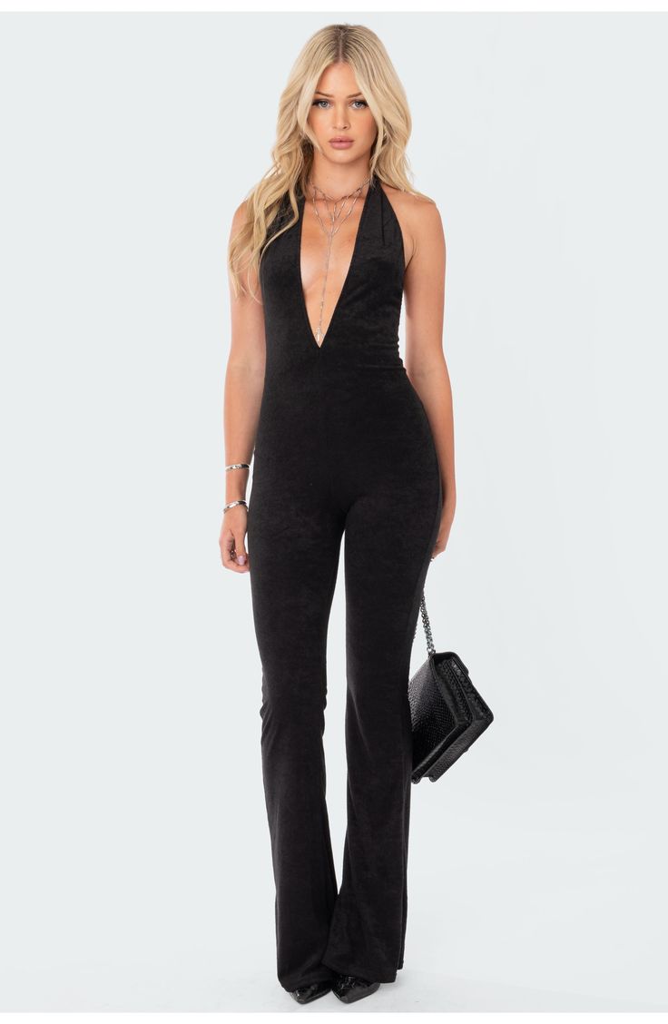 Make a striking impression in this plunge-neck jumpsuit crafted from rich velvet with an open back and wide hems. Plunge neck Halter neck Polyester/spandex Machine wash, tumble dry Imported 60s Inspired Outfits, Birthday Jumpsuit, Sparkly Jumpsuit, Disco Jumpsuit, Open Back Jumpsuit, Halter Neck Jumpsuit, Velvet Jumpsuit, Fitted Jumpsuit, Jumpsuit Outfit