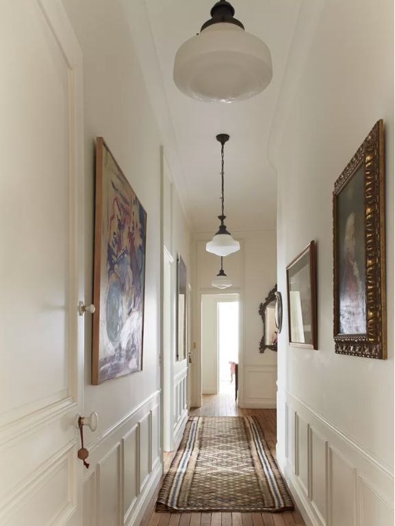 the hallway is clean and ready for us to use as an entrance way in this home