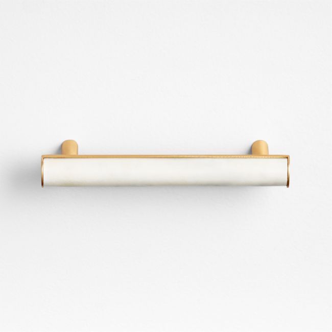 an image of a white and gold towel bar on the wall in front of a white background